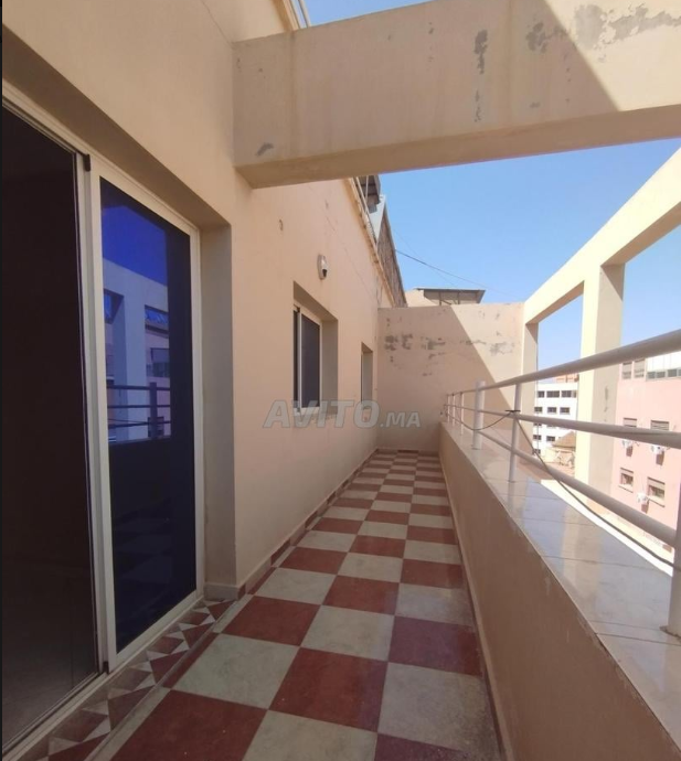 شقة للبيع شارع محمد الخامس قدام الدرك الملكي بني ملال