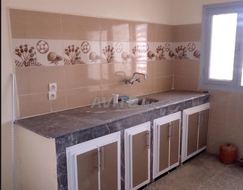 شقة محفظة 80م طابق ثالث بني ملال